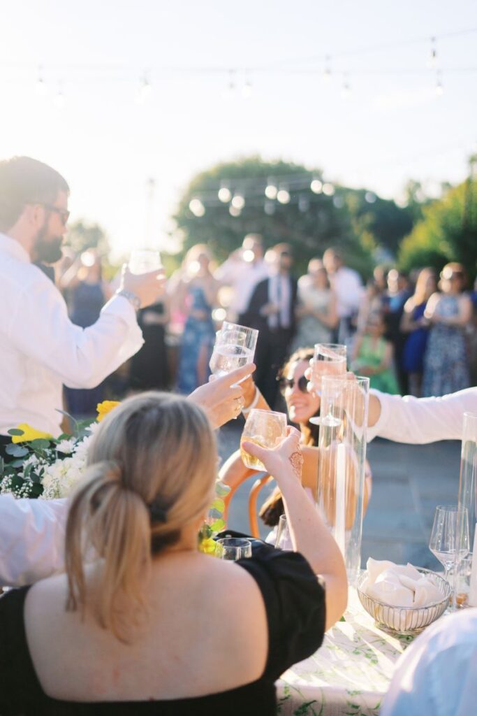 Wedding toast captured during reception, storytelling moment from Virginia wedding photographer Chantel Cruz